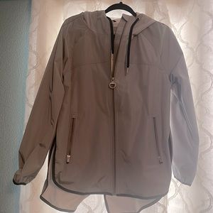Calvin Klein rain coat size M. Never worn.